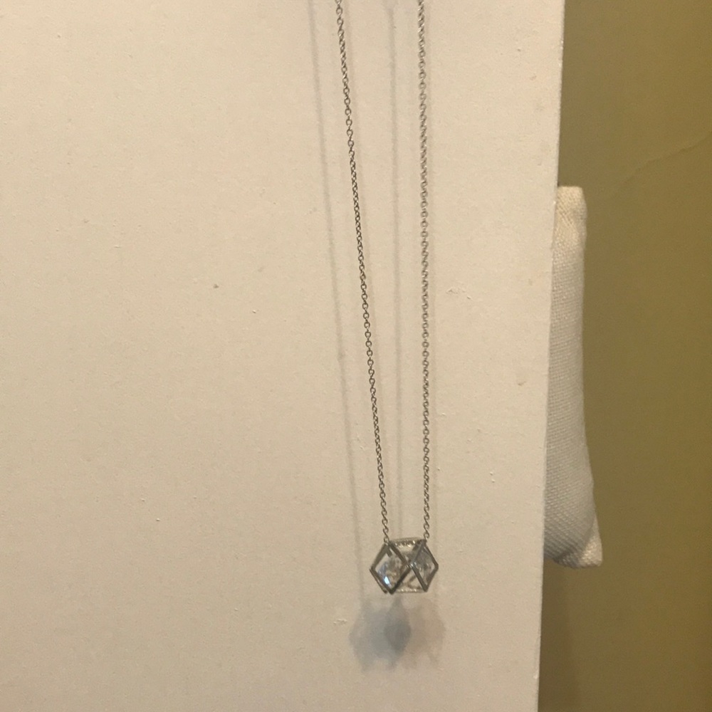 Costume necklace with jewel in middle